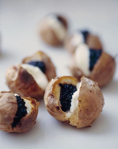 Jacket potatoes with sour cream and caviar