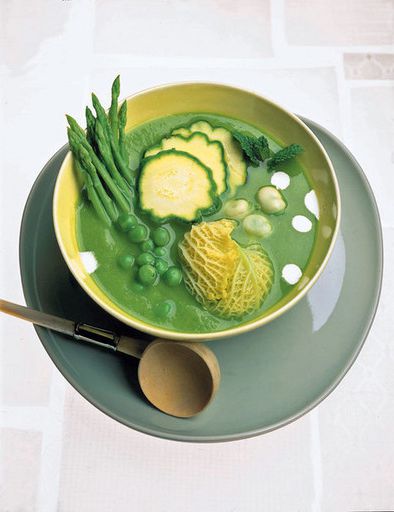 The soup of green asparagus and peas with crispy mini vegetables
