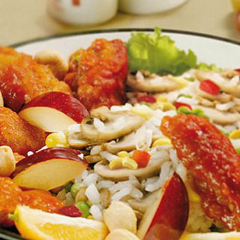 Pork under the plum and hazelnut sauce with vegetables and rice Pork under the plum and hazelnut sauce with vegetables and rice