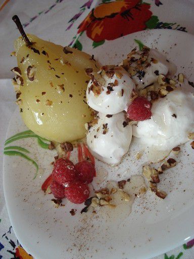 Hot pear in syrup with ice cream