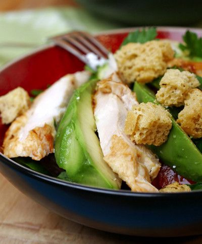 Caesar salad with chicken and avocado