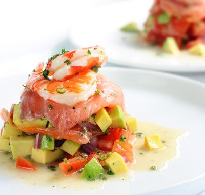 Appetizer of avocado with fish and prawns