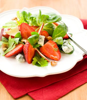 Summer strawberry salad with cheese and nuts