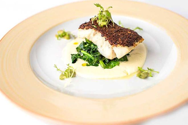 Cod in the mushroom dust with baby spinach