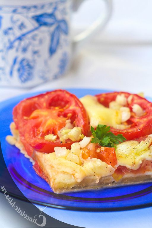 Open pie with tomatoes and mozzarella