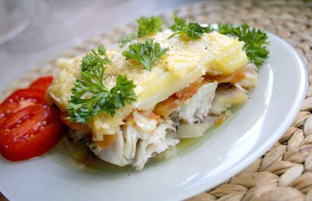 Fish with potatoes, baked with cheese