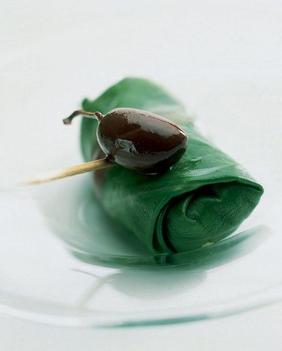 Salmon in spinach leaves