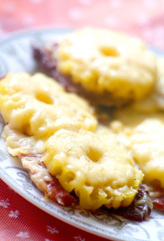 Pork baked with pineapple and cheese