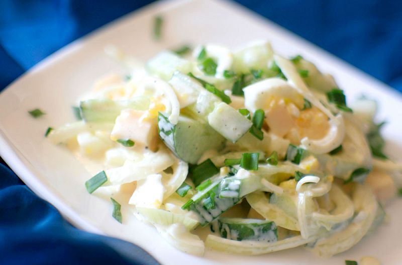 Cucumber salad, cheese and eggs with pickled onions