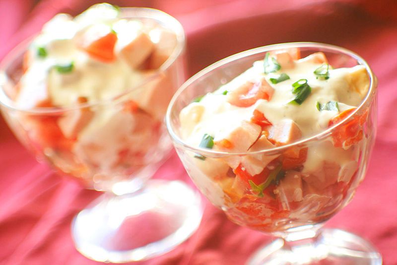 Salad with salami, cheese and tomatoes