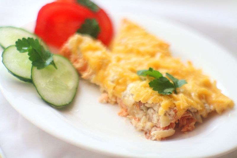 Pink salmon baked with cheese with cream - peanut sauce