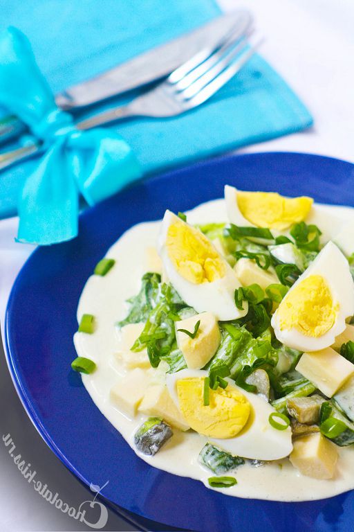 Egg salad with feta cheese, herbs and cucumbers