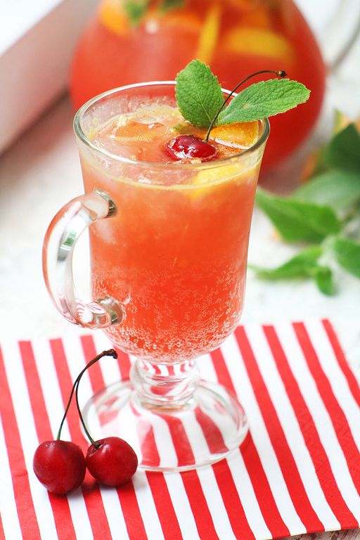 Lemonade with a cherry and orange