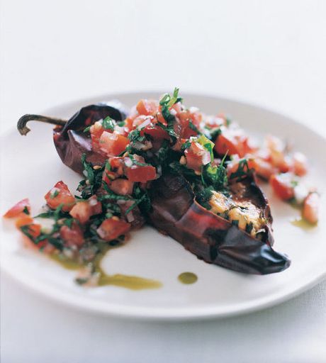 Stuffed chilies with tomato sauce
