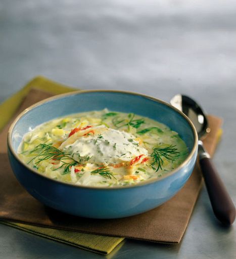 Onion soup with crab meat and whipped cream