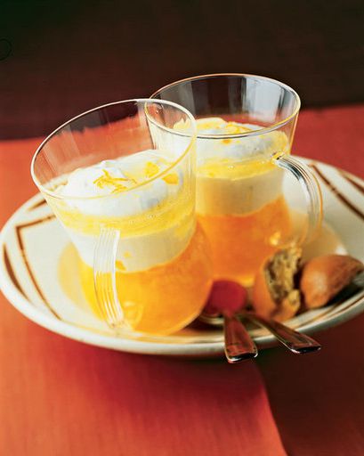 Dessert of oranges salad with whipped cream
