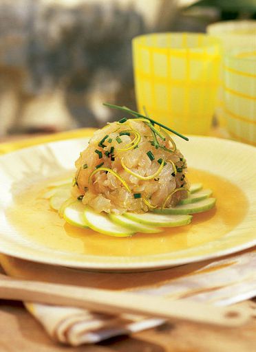 Dorada with apples in the vegetable jelly
