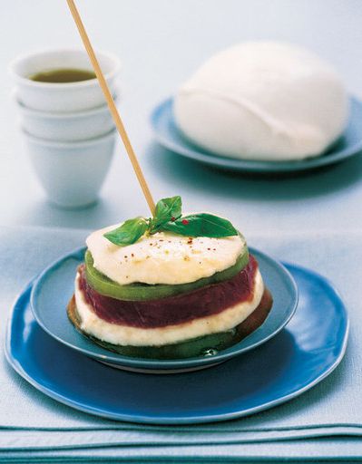 Sandwiches with mozzarella, tuna and pickled green tomatoes