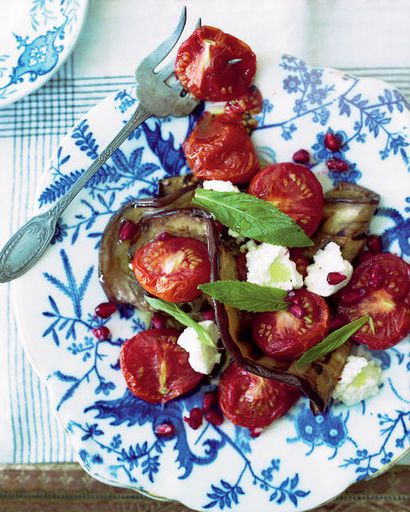 Salad of roasted tomatoes, zucchini, cheese and mint labneh