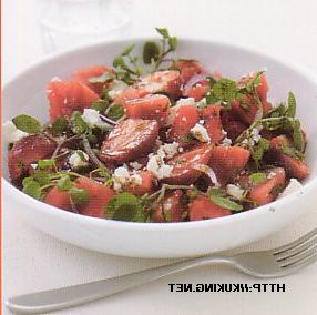 Watermelon salad with feta cheese and strawberries
