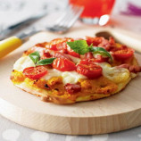 Pizza Chinese pumpkin, tomatoes and mozzarella Pizza Chinese pumpkin, tomatoes and mozzarella