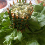 Egg salad with arugula in a basket of onion Egg salad with arugula in a basket of onion