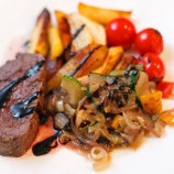 Chateaubriand of tender beef in wine sauce with vegetable saute Bordeaux Chateaubriand of tender beef in wine sauce with vegetable saute Bordeaux
