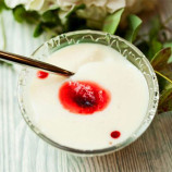 Panna cotta of yoghurt with jam from berries
