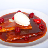 Pancakes in the caramel and citrus sauce with strawberries Pancakes in the caramel and citrus sauce with strawberries