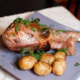 Turkey drumstick with potatoes