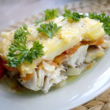 Fish with potatoes, baked with cheese