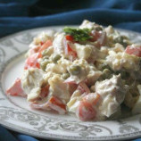 Salad with chicken, cheese and tomatoes