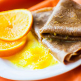 Chocolate pancakes with orange sauce Chocolate pancakes with orange sauce