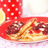 Pancakes with cottage cheese and cherry sauce Pancakes with cottage cheese and cherry sauce