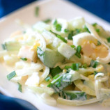 Cucumber salad, cheese and eggs with pickled onions