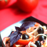 Salad with tomatoes, olives and cheese