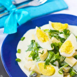 Egg salad with feta cheese, herbs and cucumbers