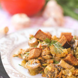 Mushroom salad with cheese, carrots and pickled cucumber