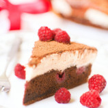 Chocolate cake with raspberries and cream — curd cream