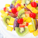 Angelic cake with fruit and a creamy cream