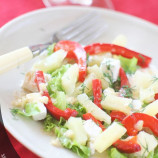 Salad with chicken, feta cheese and roasted peppers
