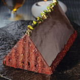 Chocolate cake with cream and pistachios Chocolate cake with cream and pistachios